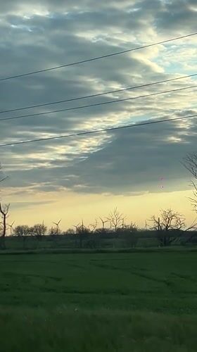 Vehicle journey documented through rural Novomargaritovo countryside