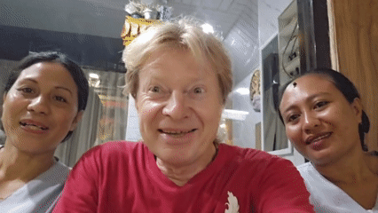 Three friends capture cheerful selfie video in Denpasar
