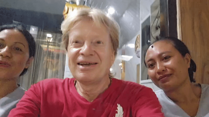 Three friends capture cheerful selfie video in Denpasar