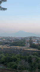 Yerevan at dusk, Mount Ararat looming over the city