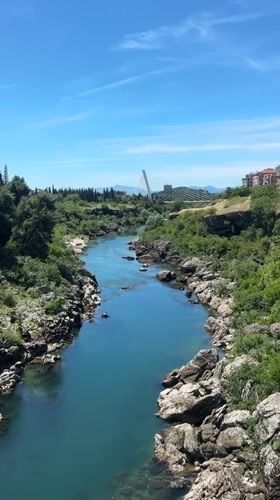 Morning riverside dining experience captured in Podgorica, Montenegro