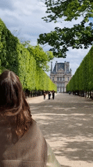 Women enjoy sunny afternoon in Paris's Tuileries Garden