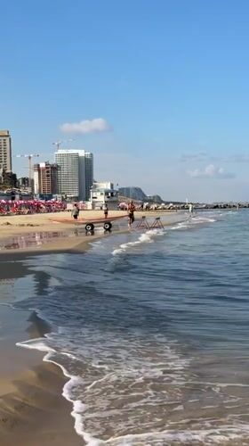 Early morning beach activities documented in Bat Yam, Israel