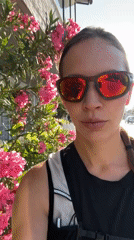 Woman takes morning selfies in Fethiye street and elevator