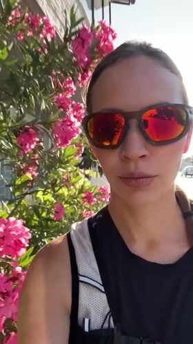 Woman takes morning selfies in Fethiye street and elevator