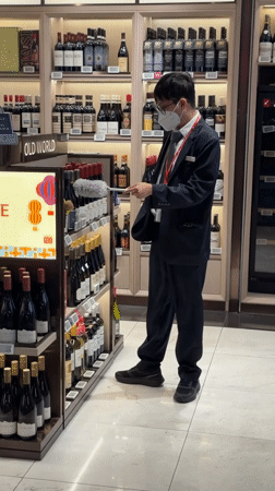Luxury retail and a police robot at Changi Airport Jewel