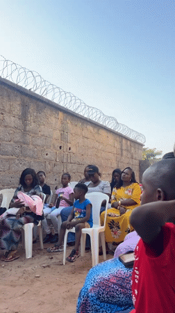 Man reads to gathering in Lafia, Nigeria