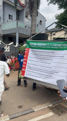 Street protest gathers in Abuja with signs and speakers