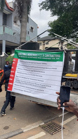 Street protest gathers in Abuja with signs and speakers