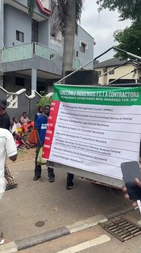 Street protest gathers in Abuja with signs and speakers