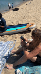 Barcelona beachgoers enjoy sunny afternoon of leisure activities