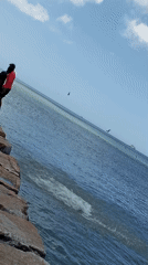 Children and youth enjoy afternoon beach activities in Pedro González