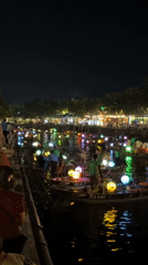 Illuminated boats with colorful lights spotted on Hội An river