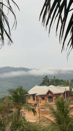 Morning fog blankets mountains in Achara, Nigeria