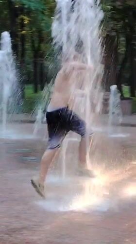 Summer afternoon at a Kyiv park fountain