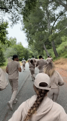 Running group in matching outfits spotted on LA hillside