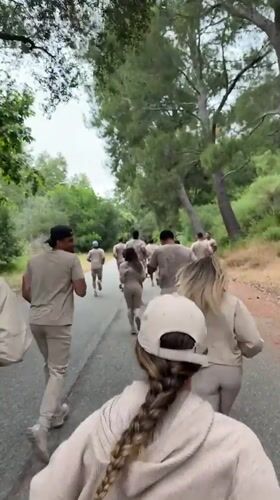 Running group in matching outfits spotted on LA hillside