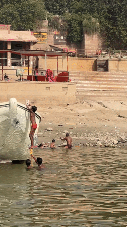 Early morning river boat activity captured in Varanasi