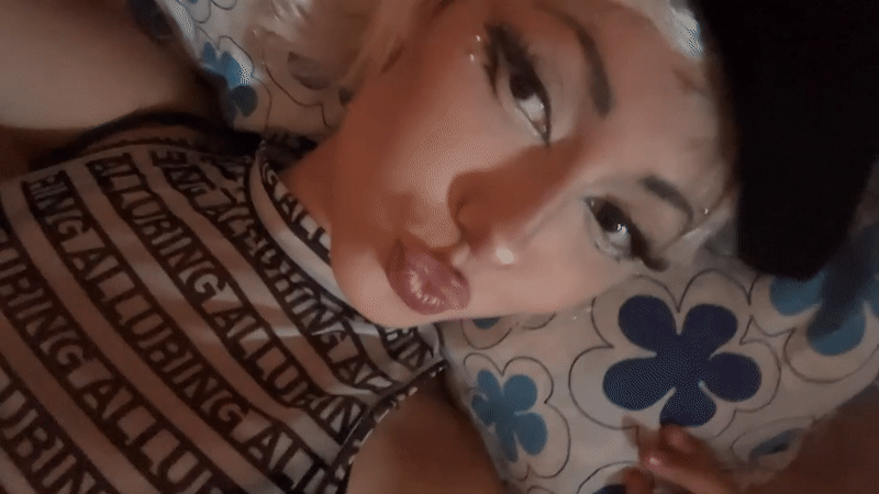 Close-up portrait on a patterned bed in Milan