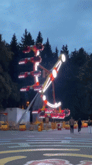Saint Petersburg amusement park lit up at twilight