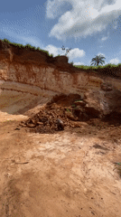 Man sorts through rocks in Igbarra, Nigeria