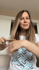 Morning routine documented in Izhevsk home with woman and cat