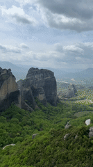Meteora's iconic rock formations and monasteries captured in landscape footage