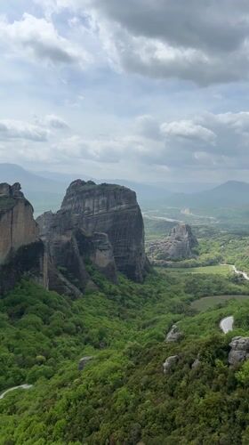 Meteora's iconic rock formations and monasteries captured in landscape footage