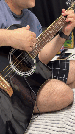 Evening at home: guitar, sleeping cat, selfies, pizza
