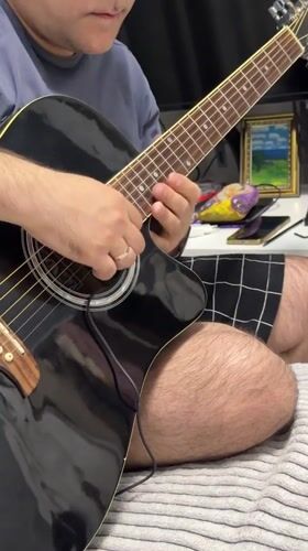 Evening at home: guitar, sleeping cat, selfies, pizza