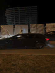 Person walks past construction site in Bar, Montenegro