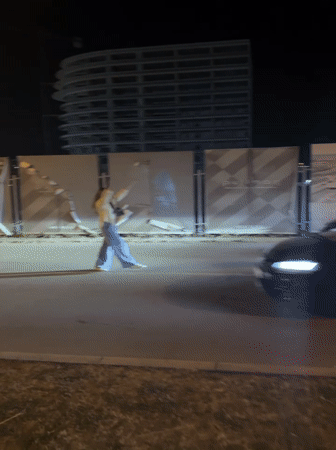 Person walks past construction site in Bar, Montenegro