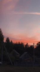 Evening sunset observed in Парэчча, Belarus displays colorful sky
