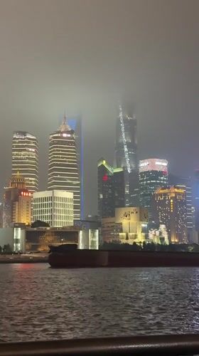 Shanghai residents document foggy Bund views, candy store visit