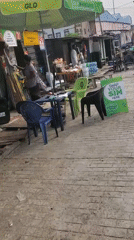 GLO telecommunications stall operates on busy Lagos street