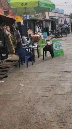 GLO telecommunications stall operates on busy Lagos street