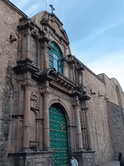 Stone building with cross documented in Cuzco
