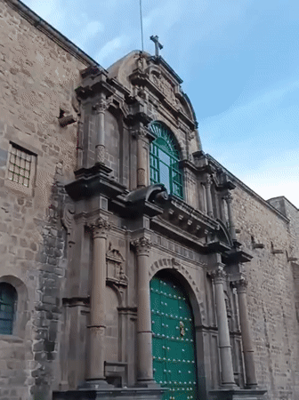 Stone building with cross documented in Cuzco
