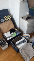 Packing scene documented in Podgorica room with scattered clothing