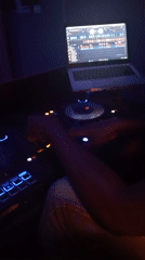 DJ performs in dimly lit venue in Lokoja, Nigeria