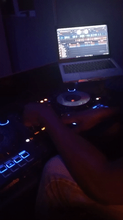 DJ performs in dimly lit venue in Lokoja, Nigeria