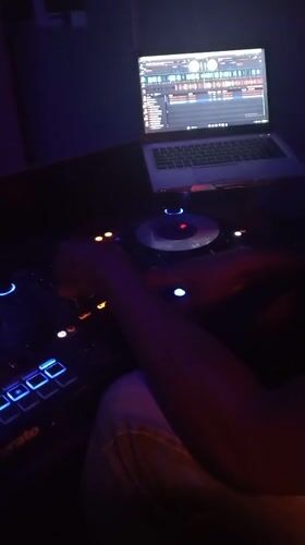 DJ performs in dimly lit venue in Lokoja, Nigeria