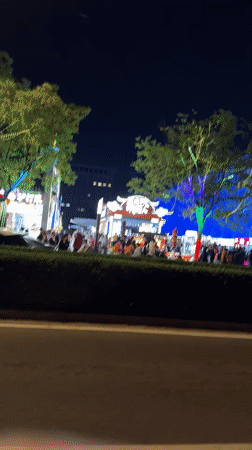 Nighttime street activity captured in Beijing's Chaoyang District