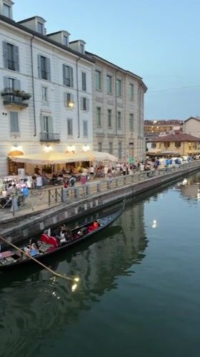 Sunset on Milan's Navigli canals, gondolas and aperitivo hour