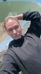 Woman takes selfie on boat in Dahab, Egypt