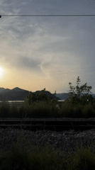 Train passenger captures sunset mountain views in Montenegro