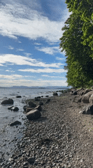 Sunny afternoon documented along Oslo's scenic rocky shoreline