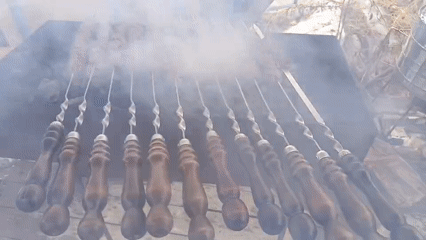 Outdoor barbecue session documented in Nizhnevartovsk, Russia