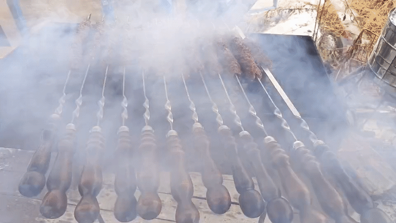 Outdoor barbecue session documented in Nizhnevartovsk, Russia