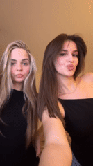 Friends pose with cat during evening hangout in Khimki